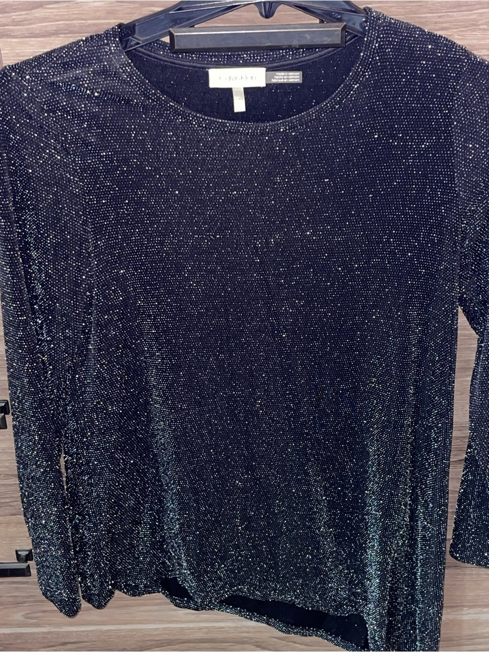 Calvin Klein sparkle Black A~Symmetrical blouse ( worn once )
